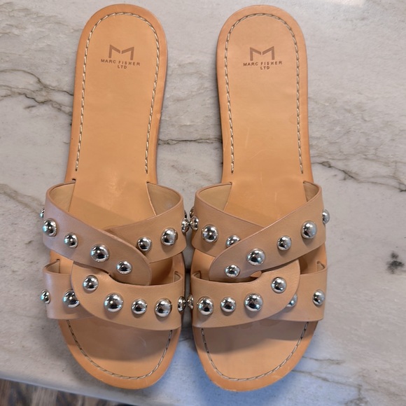 Marc Fisher tan leather slide sandals with silver grommet accents. Size 9.5. - Picture 2 of 5